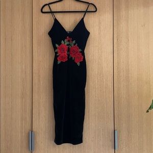 Velvet midi dress with floral detail